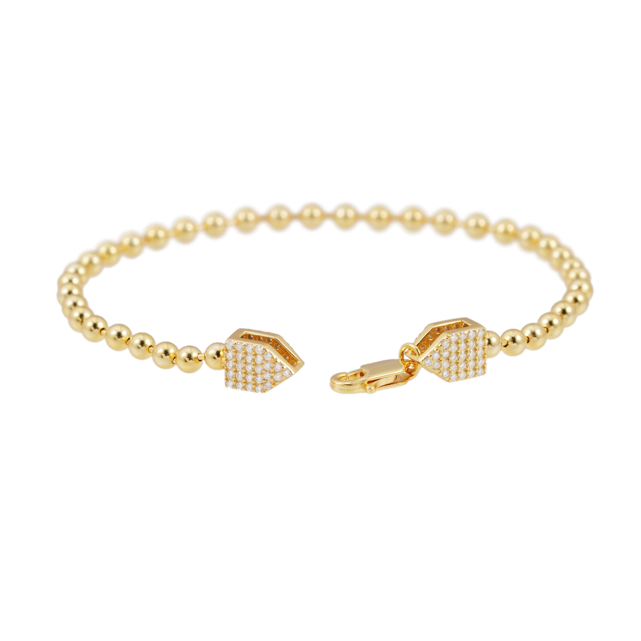 Goudkleurige ronde armband bezet met briljanten