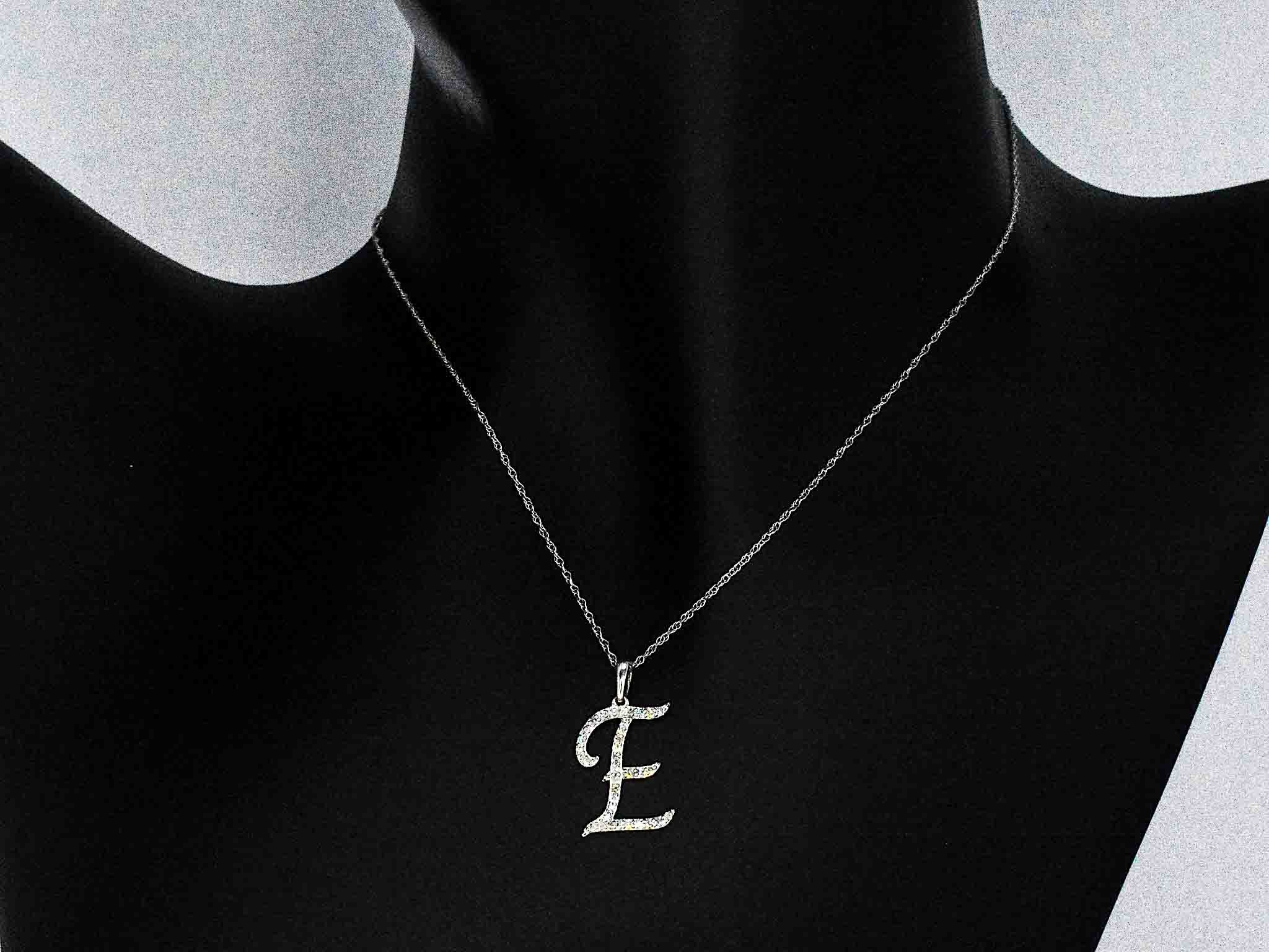 Gouden hanger ‘E’ met diamanten