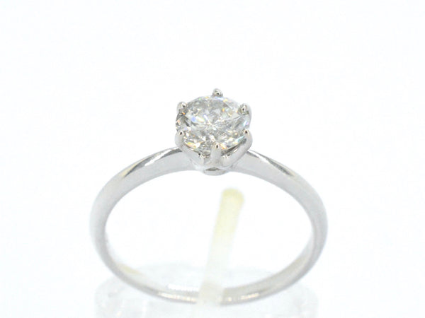 18 karaat gouden solitair ring, gezet met een natuurlijke briljant geslepen diamant van 0.80 ct