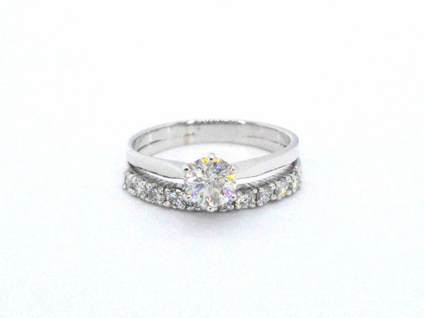 14 karaat gouden solitaire ring met aanschuifring, gezet met 11 natuurlijke briljant geslepen diamanten van in totaal 0.76 ct