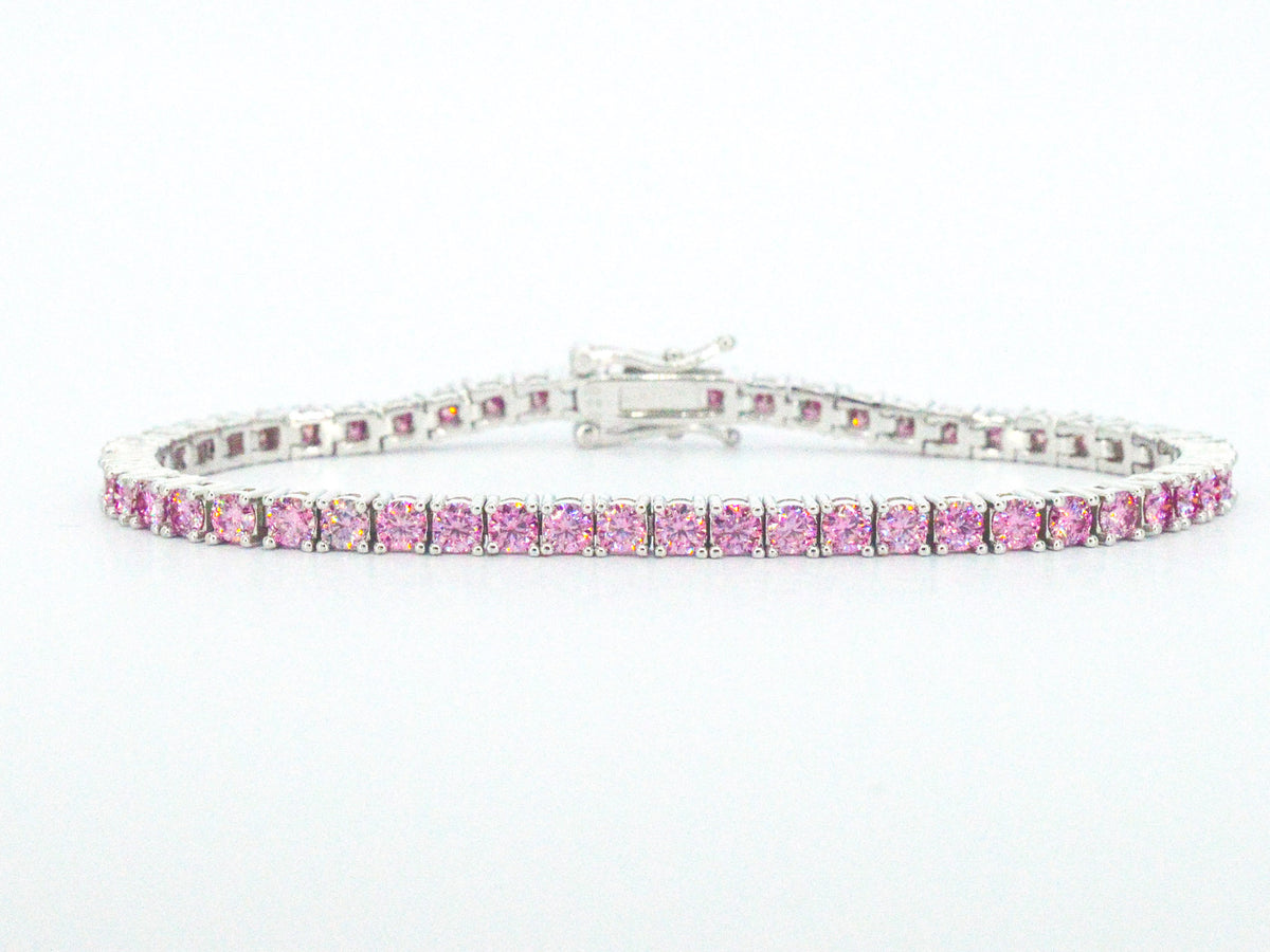 Witte tennisarmband met roze briljanten